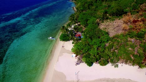 aerial over beach base with volleyball court in asia