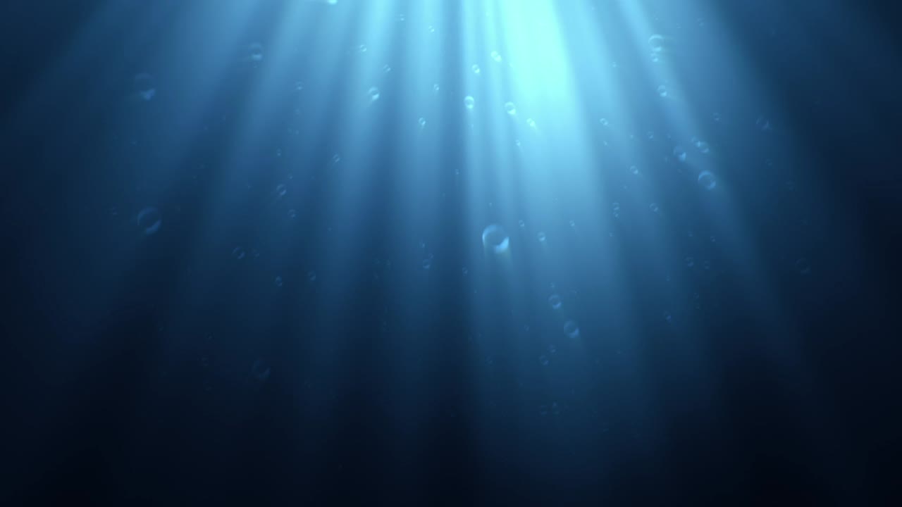 Underwater scene with light rays and bubbles