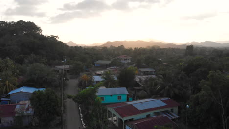 a drone shot over homes in a small central american village