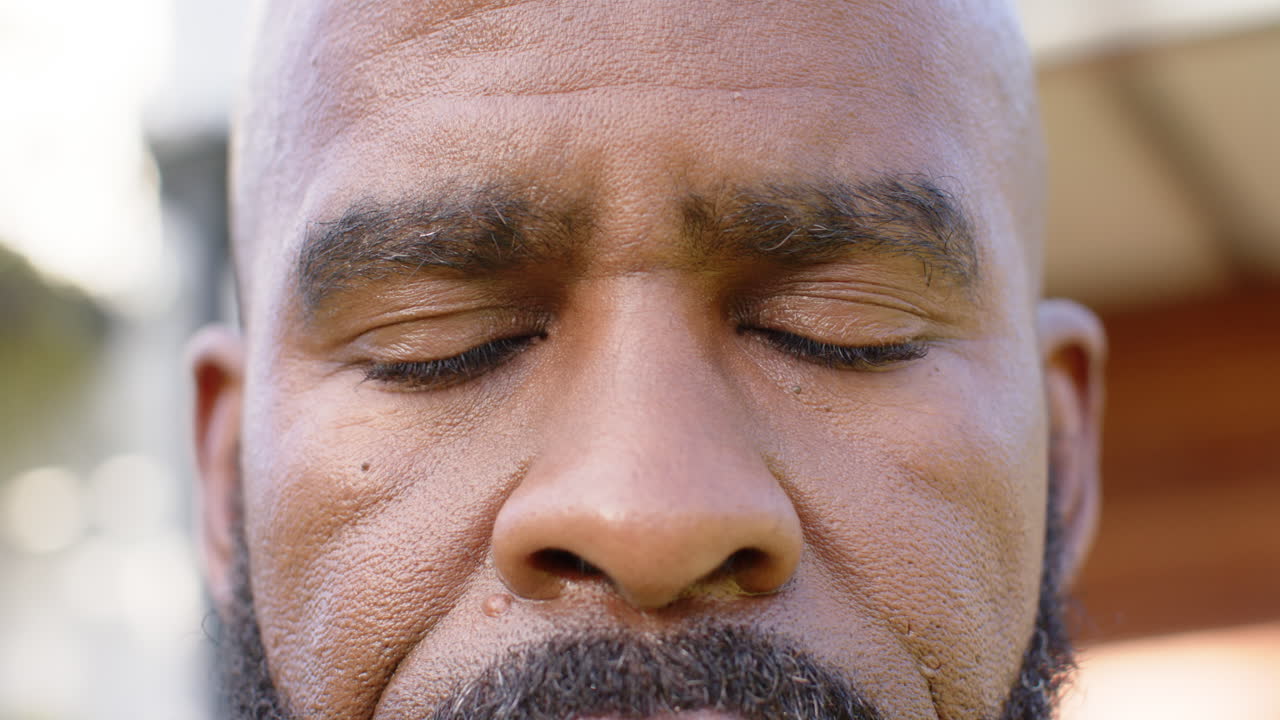 Close-up of person's face, making it difficult to provide descriptive caption