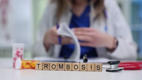 medical concept of trombosis with pills and stethoscope