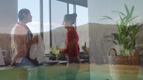 in kitchen, two women talking with forest landscape animation overlay
