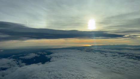 awesome sky view at sunset flying westbound to valencia airport, with the mediterranean coast at the back