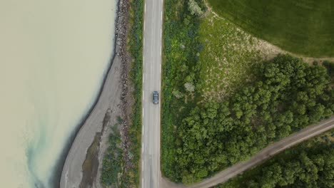 droneshot closing in on moving car