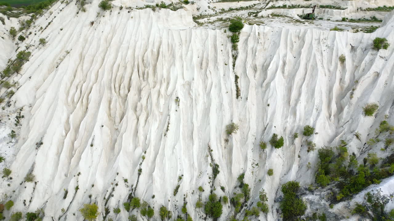 Aerial drone view of the Little Switzerland of Moldova located in Fetesti. Former limestone quarry with unusual landforms