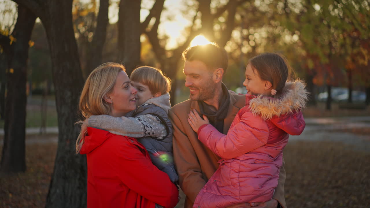 Family enjoying autumn in the park