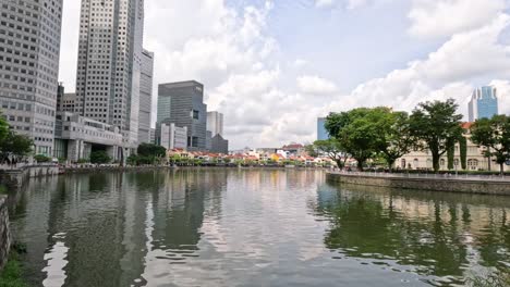 calm water mirrors a vibrant urban skyline.