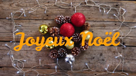 joyeux noã«l written over christmas decorations