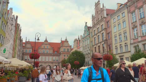 young people walking calmly through gdansk old town streets, poland