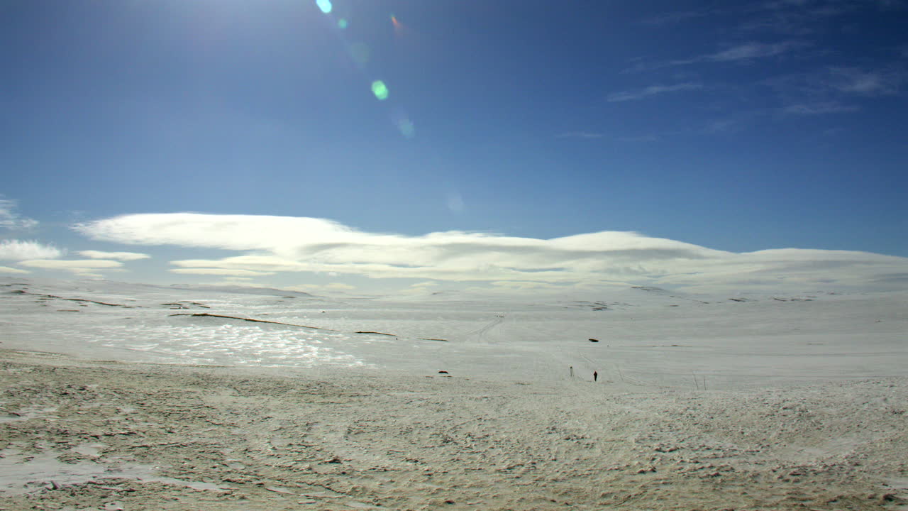 Extra wide long shot of the Hardangervidda mountain plateau at Dyranut in April 2025