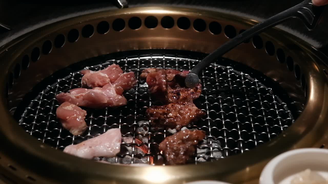 HD 1080p slow motion for cooking Korean BBQ with beef and meat. Epic flame and smoke.
