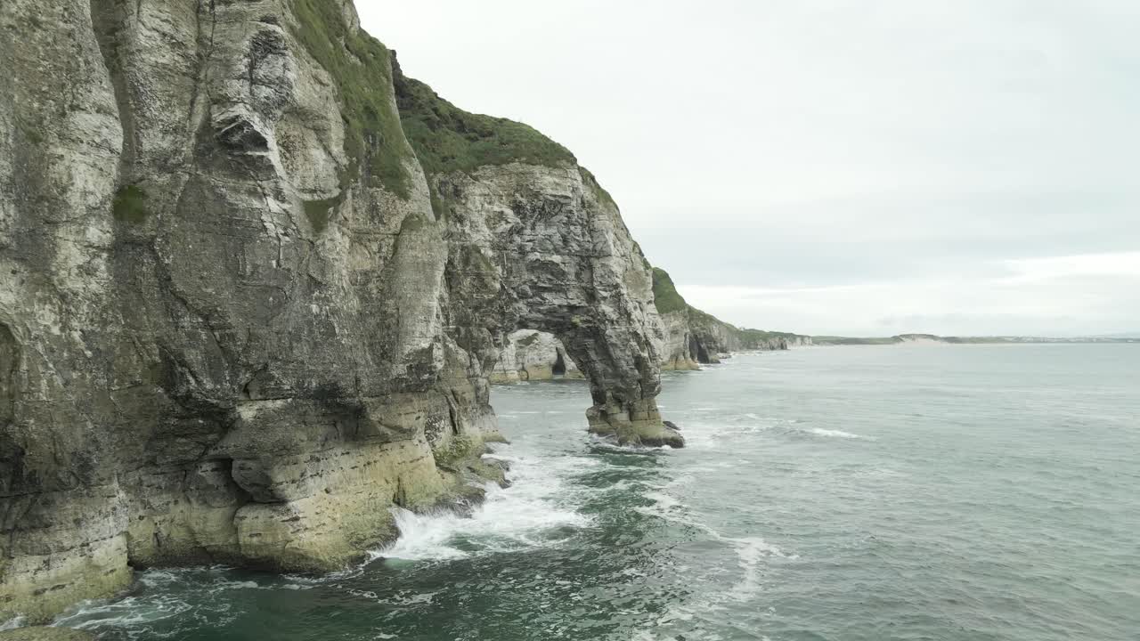 Unseen marvellous white cliff rocks of Portrush Ireland aerial