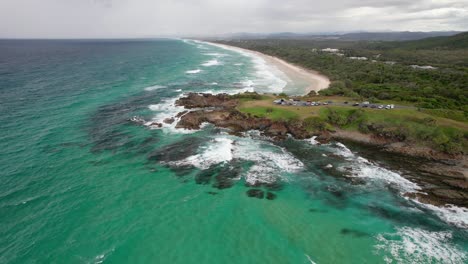 hastings point lookout and turquoise blue waters in nsw, australia. - aerial shot