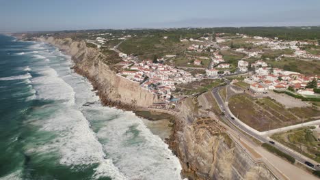 long strong waves crash on coastal rocks and cliffs, azenhas do mar, portugal