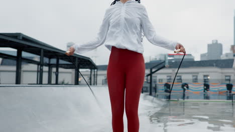 woman, fitness and skipping rope in city