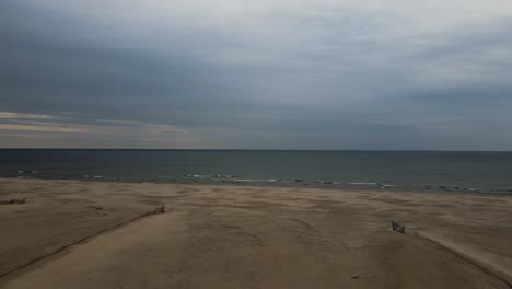 drone view of cresting waves during spring storm