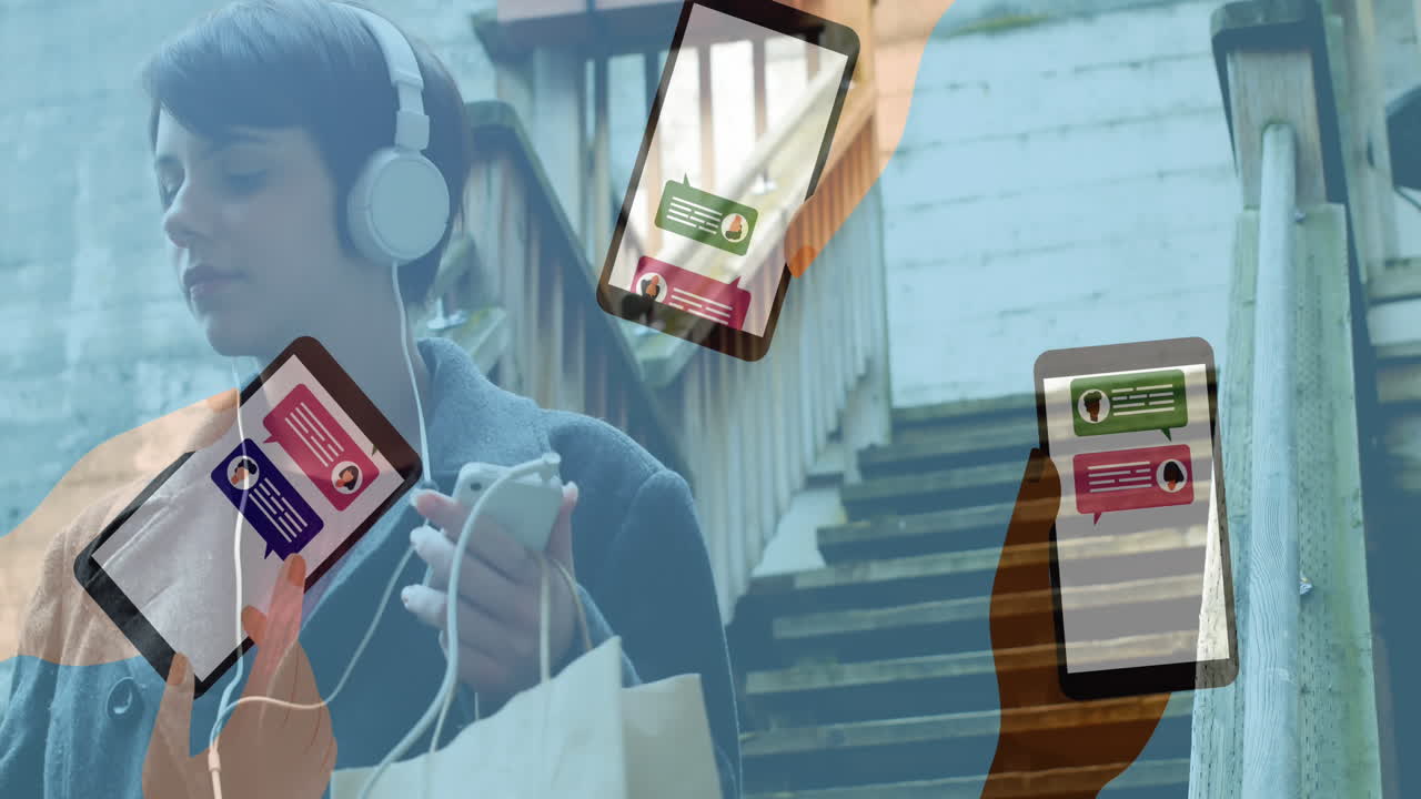 스마트워치를 사용하는 손과 헤드폰을 착용한 여성이 계단을 내려가고 있습니다.