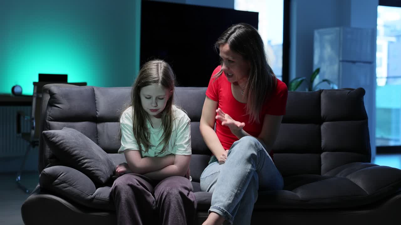 Mother and Daughter Arguing on Couch