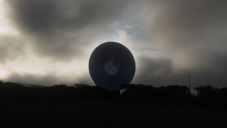 Timelapse-shot-of-a-lonely-Space-Array,-in-middle-of-mysterious-dark-clouds