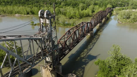 aged railway bridge over lee creek park in arkansas, united states