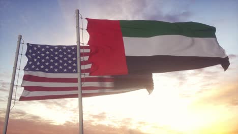 united arab emirates and united states flag on flagpole. uae and usa waving flag in wind. uae and united states diplomatic concept