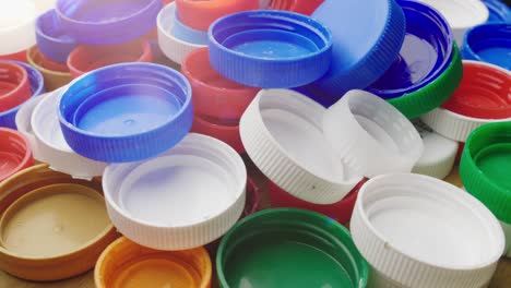 many plastic bottle caps. recyclable and recyclable plastic waste concept