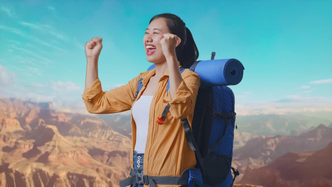 Side View Of Asian Female Hiker With Mountaineering Backpack Screaming Goal Celebrating The Success While Traveling At The Top Of Mountain