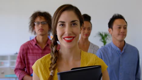 Happy-multi-ethnic-business-colleagues-walking-together-in-modern-office-4k