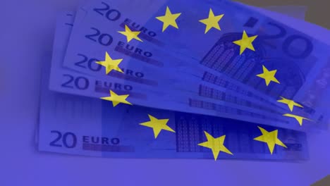 animation of flag of european union over euro currency