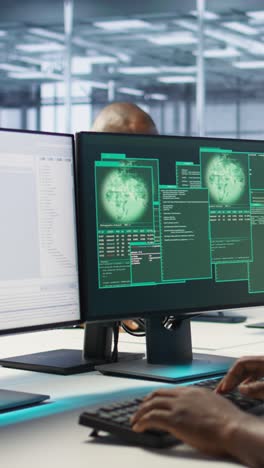 Vertical video Cybersecurity division workers in server room protecting equipment
