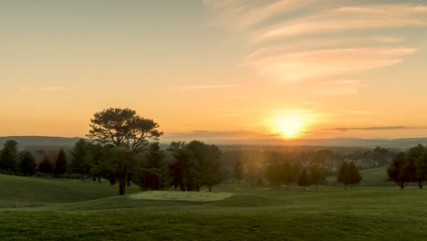 Beautiful-Golden-Sunset-on-golf-course-hills-in-Blacksburg-Virginia---Timelapse