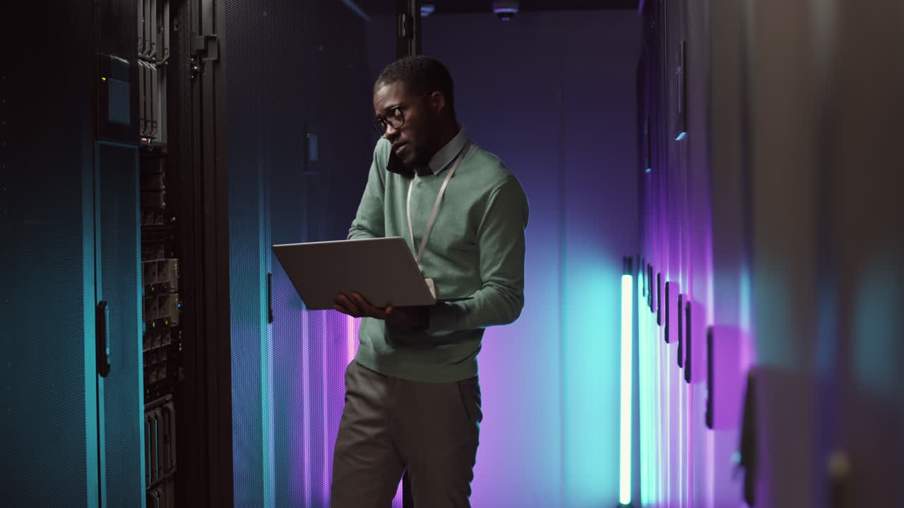 IT Technician Working in Server Room