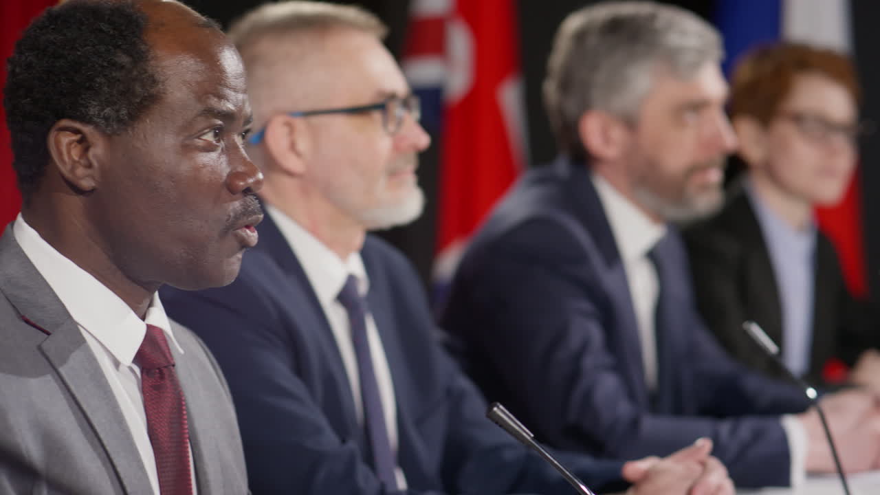 African American Diplomat Giving Speech at Press Conference