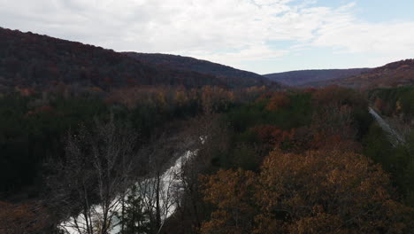 autumn foliage around cedar flats basin in winslow township, arkansas, usa