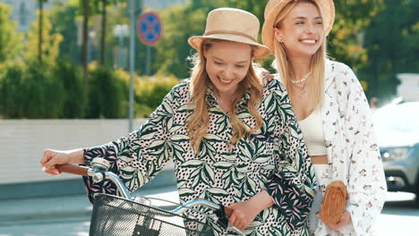 two friends walking with bicycle