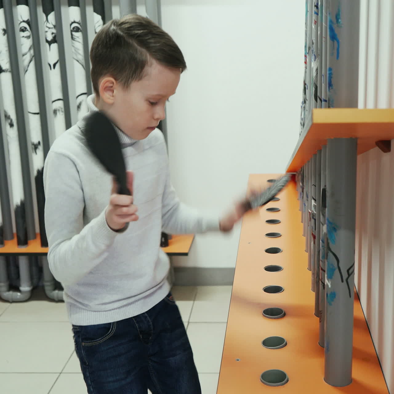 Boy conducts research experience. Museum of entertaining sciences Square video