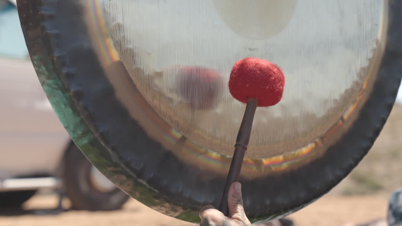 Slow Motion Gong being Struck.