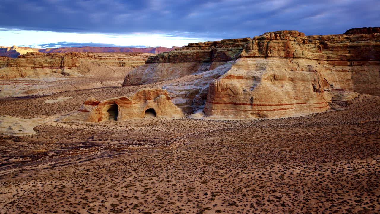 Beautiful drone sequence over an alien-like desert filled with colorful hoodoo rocks.