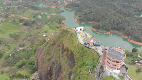 breathtaking view at piedra el penol in guatape near medellin, colombia - aerial drone shot