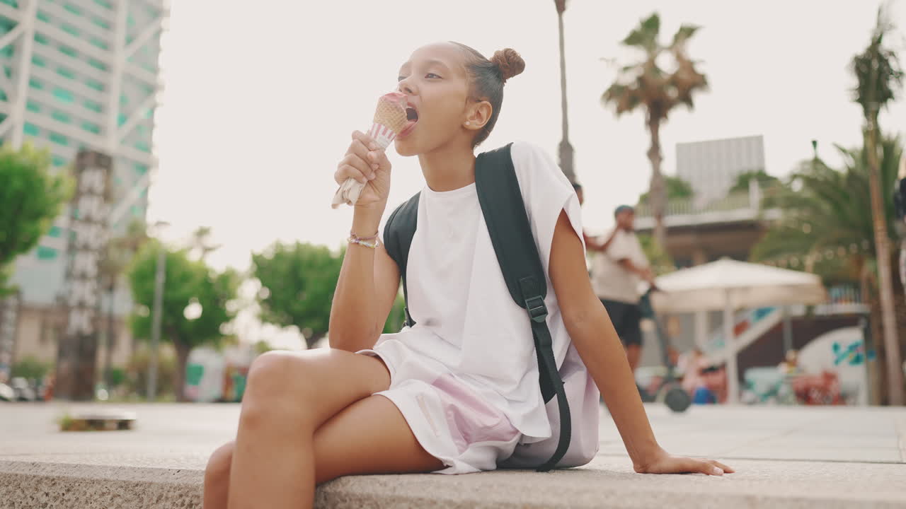 Girl eating ice cream in the city
