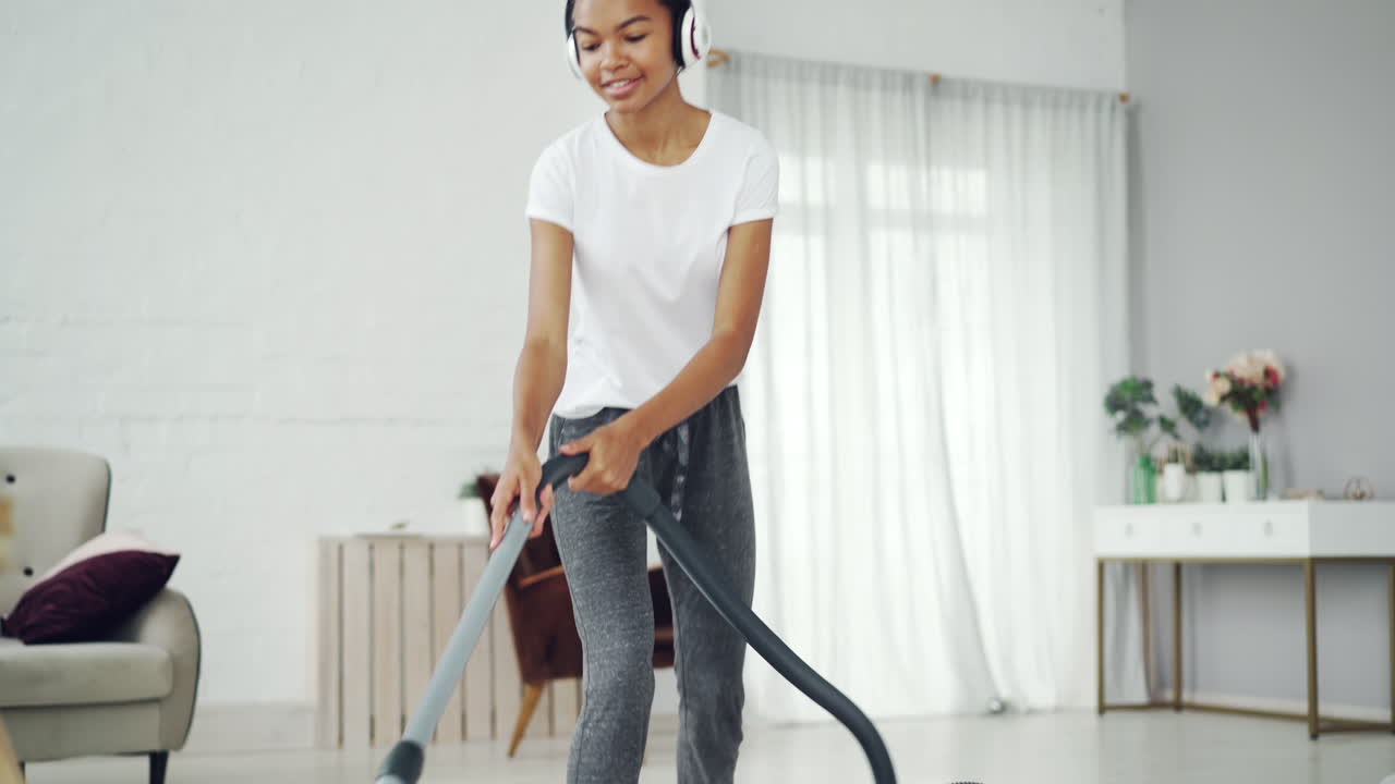 Woman Vacuuming in a Modern Home