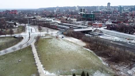 aerial shot flying towards downtown hamilton on a grey winter day