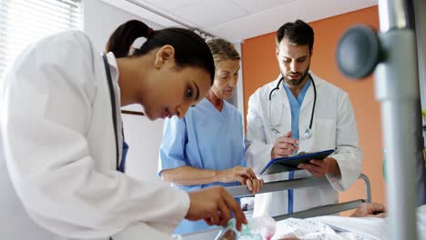 doctor putting oxygen mask on a female senior patient face