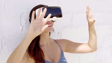 Young-woman-wearing-virtual-reality-glasses