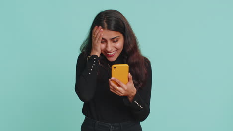 Happy-excited-indian-winner-woman-use-smartphone-say-wow-yes-found-out-great-win-good-news-lottery