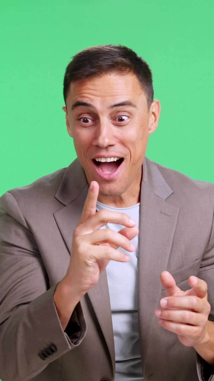 Businessman thinking and having a brilliant idea on a green screen