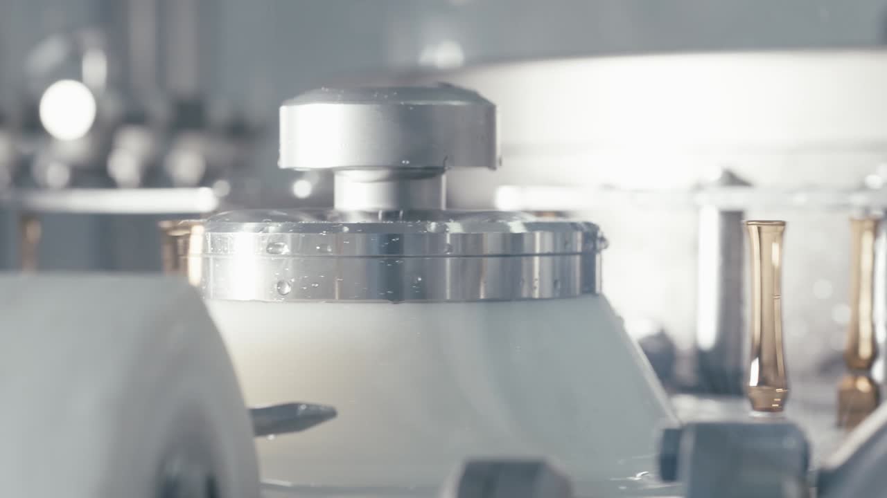 Chemical liquids rotating on a conveyor machine in a modern pharmaceutical manufacturing factory