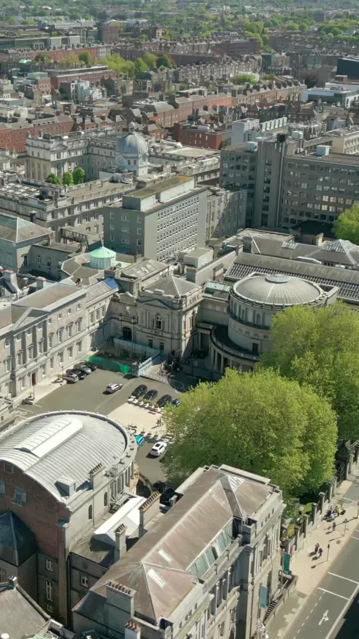 Wide social ratio aerial video of the Irish Government's Seanad Éireann building in Dublin City Centre, Ireland on a bright and sunny day. Filmed in 1080x1920 and with Rec709 color