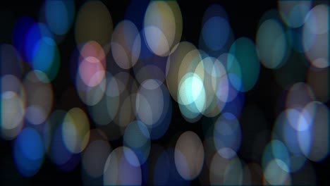 Animación-De-Bokeh-Con-Círculos-Multicolores-Aumentados-En-Altura-Y-Una-Sutil-Deriva-Horizontal.