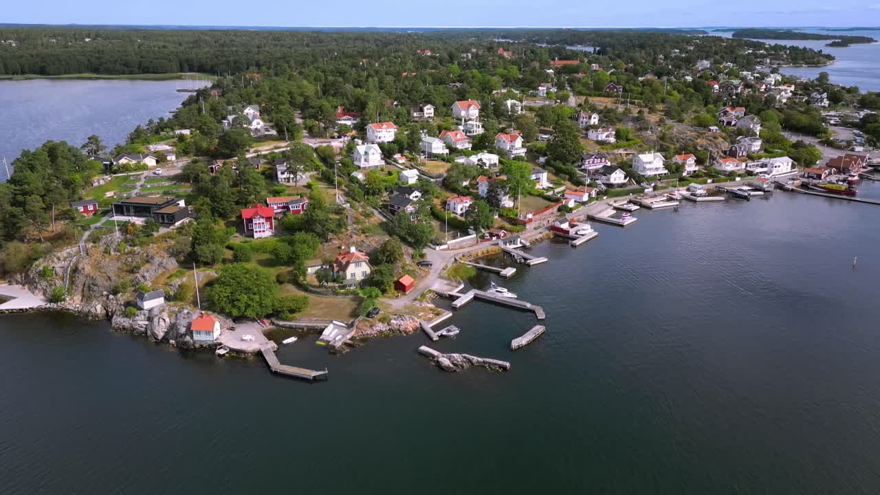 Drone shot orbit of seaside village Dalar&ouml; in the swedish archipelago